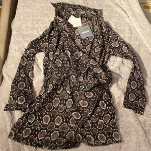 NWT. Sexy romper. Snakeskin pattern